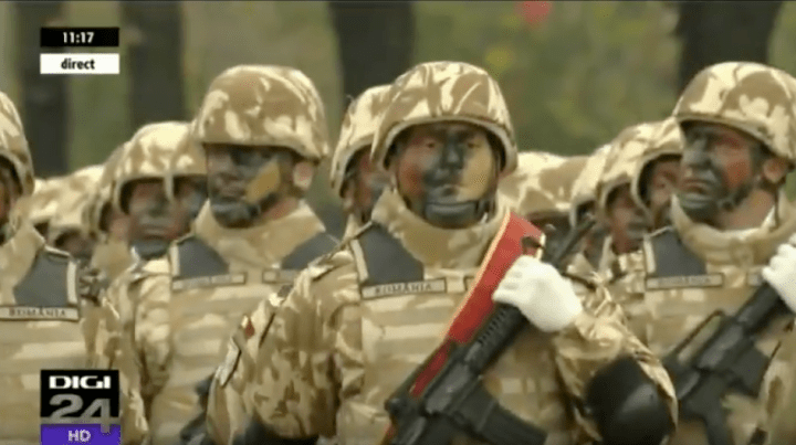 Camouflaged Romanian soldiers on parade